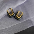 U-shaped 18K gold plated earrings with dark marble resin on grey mesh fabric - Ink