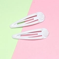 Detailed view of white enamel snap clips with translucent anti-slip silicone pads - White