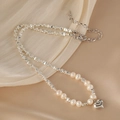 Rice freshwater pearl necklace with silver metal beads and heart pendant on beige fabric - Pearl Silver Bead Heart Pendant Style (U-d-015)