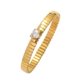 Detail of a gold flexible bracelet featuring a heart-shaped zircon on a white background - Bracelet-Silver Color