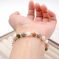 Multicolor beaded bracelet with natural stone and gold spacers on a jewelry display tray - 6mm Beaded Bracelet