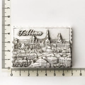Macro view of Tallinn Estonia 3D resin fridge magnet with size scale and stamp edge - Tallinn Estonia