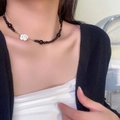 Elegant black beaded necklace featuring a single white camellia charm for women - Camellia Black Bead Clavicle Chain (DX0265)