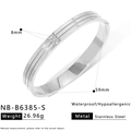 Silver stainless steel geometric bangle with three inset diamonds and dimensions shown - Three-Stone Inlaid Style (NB-B6385-S) / Silver