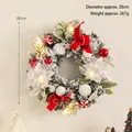 30cm Christmas wreath with red bows, white flowers, LED lights and artificial snow - Red White Flower Wreath 30cm With Lights