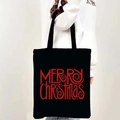 Black canvas tote bag featuring red Merry Christmas artistic lettering on the front - Style 18-Red Flourish Merry Christmas
