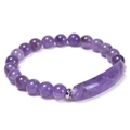 Detail view of natural purple amethyst bracelet with smooth round beads and focal stone - Amethyst