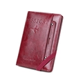 RFID-blocking passport wallet in burgundy faux leather with travel patterns and elastic strap - Burgundy