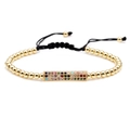 Adjustable black woven bracelet with gold beads and a multicolor zircon rainbow bar charm - Colored Zirconia Style / Gold