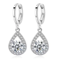 Silver teardrop earrings with a central round diamond and pavé halo on white background - White Diamond Teardrop Earrings Led-90