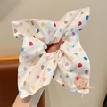 White hair scrunchie with colorful hearts, bear patch and beige bow detail - White Multi Heart Bear Patch