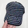 Black baseball cap with colorful rhinestones and pearls shown in a hand-held view - Adult, Adjustable / Black AB Color Rhinestones