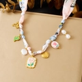 Pink floral silk ribbon necklace with gold heart, pearl, and flower charms - Pink Floral Multi Element Pendant Style (N3839)