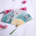 Classic Chinese folding fan with teal gradient silk, floral butterfly print and green tassel - Blue-Green Gradient Butterfly Floral Style (Women's Fan-80)