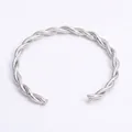 Minimalist silver braided stainless steel open bangle with industrial twisted design - Braided Twist / Steel
