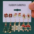 Christmas earrings set featuring Santa, snowflake, and tree charms on a display card - 30 Tree Snowflake Wreath (6 Pairs Set)