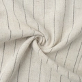 Detailed macro view of beige striped linen fabric showing soft texture and vertical patterns - S / Top And Bottom / Apricot Stripe