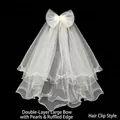 Luminous double-layer bridal veil with large bow, pearls, and hair clip attachment - Beaded Tulle Bow Veil
