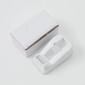 Minimalistische witte tapehouder met transparante kern en bijbehorende doos - Wit
