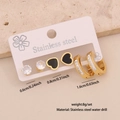 Three-pair gold stainless steel earring set with black heart, zircon studs, and small hoops - Heart / Zirconia / Hoop