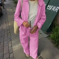 Dames vrijetijdsset bestaande uit een roze en wit gestreept overhemd en broek - S / Roze