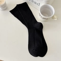 Classic ribbed cotton black crew socks for women featuring a minimalist vertical knit design - One Size / Black
