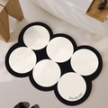 Semicircle wave-shaped white diatom mud bath mat with black trim and GO BATH lettering - Diatom Mud - Star Circle - Black and White