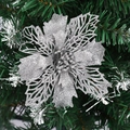 Artificial silver glitter Christmas flower with hollow petals on green tree branch - Silver