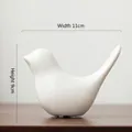 Minimalist white ceramic bird ornament with matte finish, dimensions 11cm by 9cm - Large / White
