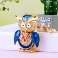 Golden owl keychain with blue enamel, sparkling rhinestones and a sturdy metal ring - A430 Owl P Royal Blue