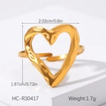 Detail view of golden heart ring showing hand-hammered texture and adjustable open band - Gold Hollow Hammered Heart (HC-R30417)