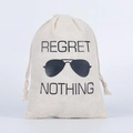 Off-white cotton canvas drawstring hangover kit bag with Regret Nothing graphic print - Black Sunglasses / 10*15cm