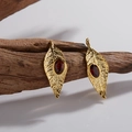 Leaf design gold earrings featuring a natural red oval garnet stone inlay - Earrings / Gold / Garnet