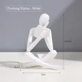 Nordic abstract white resin thinker statue in reading pose, dimensions 8x6x11.5cm - White Right Reading