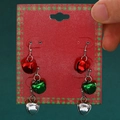 Festive Christmas bell earrings in red green and silver on a decorative holiday card - Red Green Silver Bell (11377)