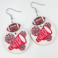 Detail of wooden cheerleading earrings featuring a brown football and red cheer megaphone - Red White