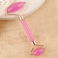 Pink dual-head jade facial roller with rose gold frame for neck and face massage - Resin Double Head Roller Transparent Pink