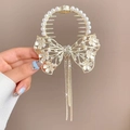 Fermaglio per capelli dorato a fiocco con perle, strass e lunghe nappe pendenti - J9 Camelia Nappa Molletta a Griffe