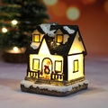 Luminous resin Christmas house ornament with warm LED light and snow finish - Style C