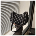 Detail of checkered tweed crossbody bag with silver chain strap and frayed fringe edge - Black Checkerboard
