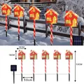 Solar powered Christmas house stake lights with red housing and candy cane pole - Battery Box / Gift House