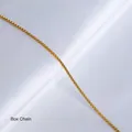 Macro shot of 18K gold-plated box chain necklace on elegant white satin background - 1.2mm Box Chain 40+5cm-Gold