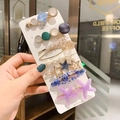 Fashionable pearl and rhinestone hair clip set featuring purple starfish and geometric shapes - Starfish Hair Clip 8-Piece Set
