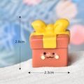 Miniature gift box ornament with yellow bow and cute face in artificial snow, 2.8cm - No.13 Christmas Gift Box