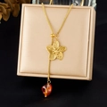 Gold camellia flower necklace with resin gemstone pendant on a refined snake chain - Gold Camellia Amber Resin Pendant Style (N4030)