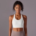 Vue de face d'un soutien-gorge de sport blanc à fort impact avec larges bretelles - Blanc