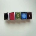 Detailed view of five vintage-style miniature notebook hair clips in assorted classic colors - 11# Red Blue Book Clip