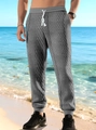 Pantaloni jogger grigi da uomo con trama jacquard a rombi e coulisse regolabile in vita - S / grigio scuro