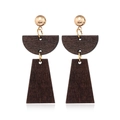 Detail view of retro geometric wood and gold metal earrings showing natural grain texture - Style 55