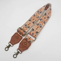 Close-up of bohemian embroidered bag strap with vintage bronze metal hooks and leather ends - Antique Bronze Hook / No.3 Brown Leather